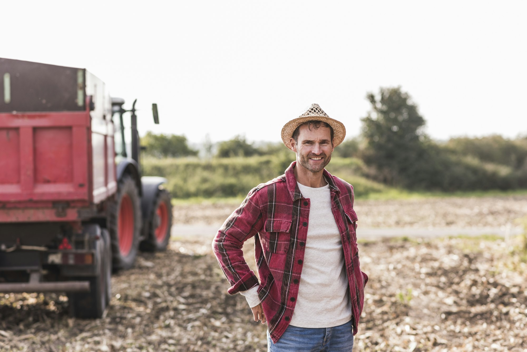 Portrait of confident farmer on field
